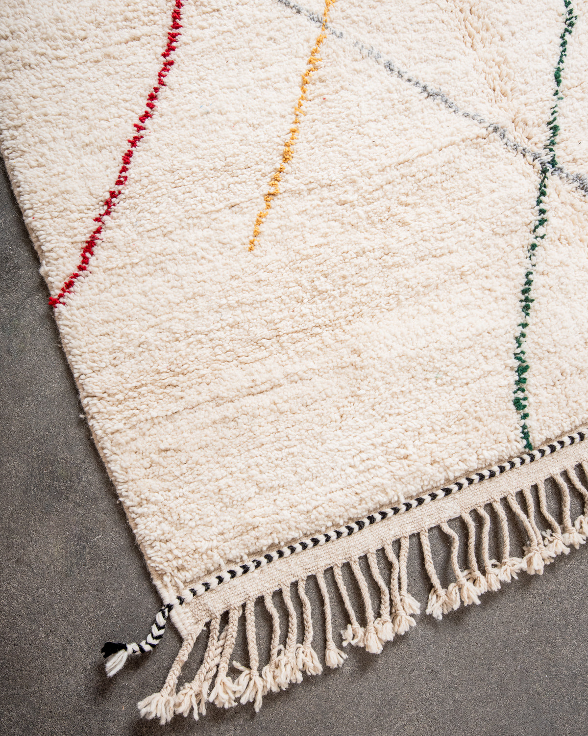 Modern, designer, handcrafted Berber rug from Morocco. Beniourain carpet with beautiful colours and patterns and fluffy wool texture.